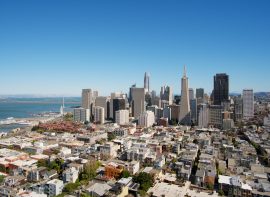 city buildings under blue sky during daytime